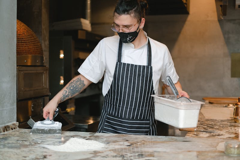 Papa Ginos kitchen team preparing fresh dishes
