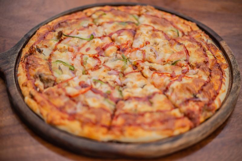 Meat Lovers pizza piled high with multiple premium meats