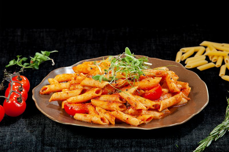 Penne Arrabbiata in a spicy tomato and garlic sauce